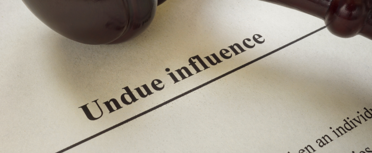 Undue influence written on a paper