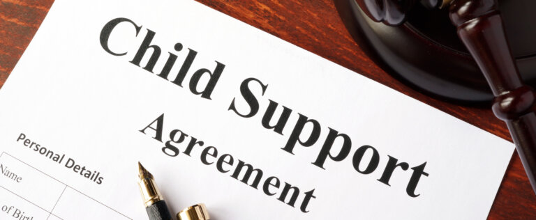 Child support agreement on an office table.